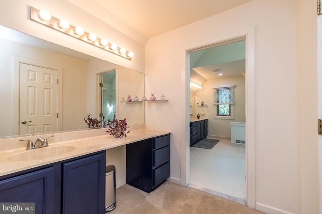 bathroom with baseboards, visible vents, and vanity