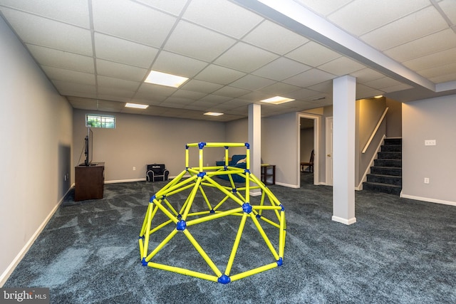 recreation room featuring carpet flooring and baseboards