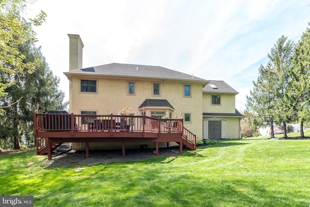 back of property with stairs, stucco siding, a chimney, and a deck