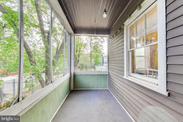unfurnished sunroom with a healthy amount of sunlight