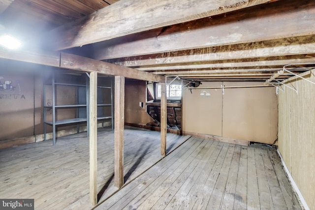 below grade area featuring light wood-style flooring