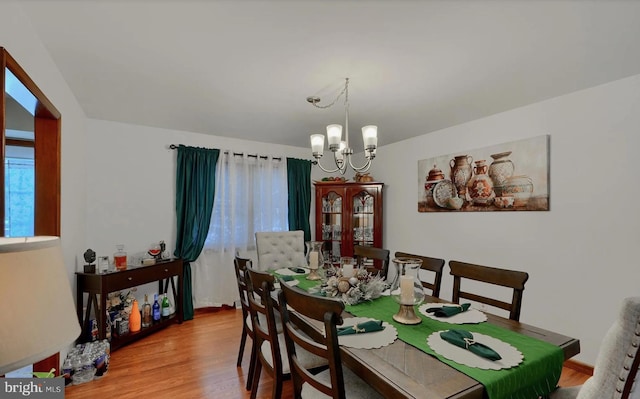 20416 Old York Rd, White Hall, MD 21161 - dining room with an inviting chandelier and wood finished floors