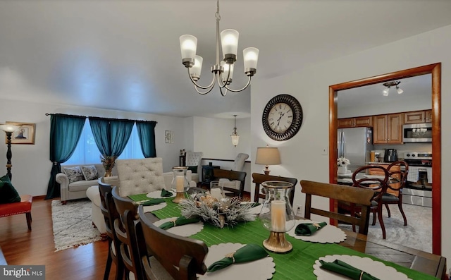 20416 Old York Rd, White Hall, MD 21161 - dining area featuring dark wood-type flooring and a notable chandelier