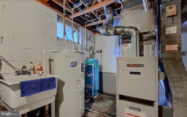 20416 Old York Rd, White Hall, MD 21161 - utility room with a sink, heating unit, and water heater