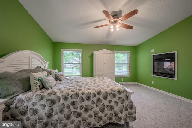 12 Woods Cir, Ocean View, DE 19970 - bedroom featuring carpet, vaulted ceiling, baseboards, and ceiling fan