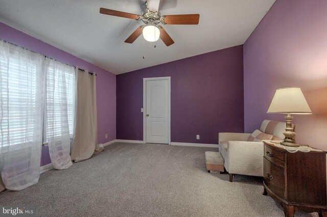 12 Woods Cir, Ocean View, DE 19970 - living area featuring lofted ceiling, carpet floors, baseboards, and a ceiling fan