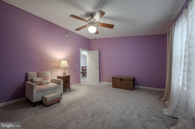 12 Woods Cir, Ocean View, DE 19970 - sitting room with carpet floors, ceiling fan, and baseboards