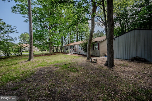 12 Woods Cir, Ocean View, DE 19970 - view of yard featuring an outbuilding