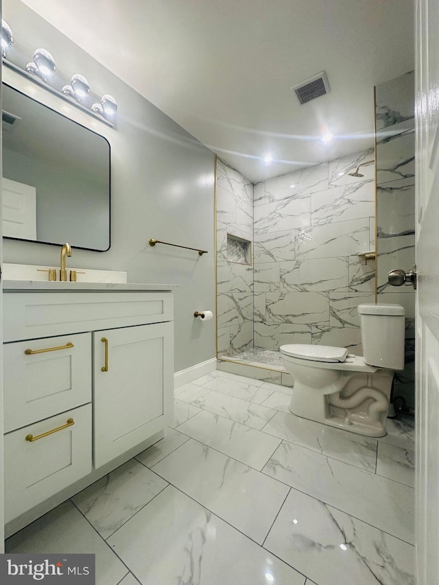 7002 Taylor Manor Ave, Temple Hills, MD 20748 - full bath featuring marble finish floors, toilet, a marble finish shower, baseboards, and vanity