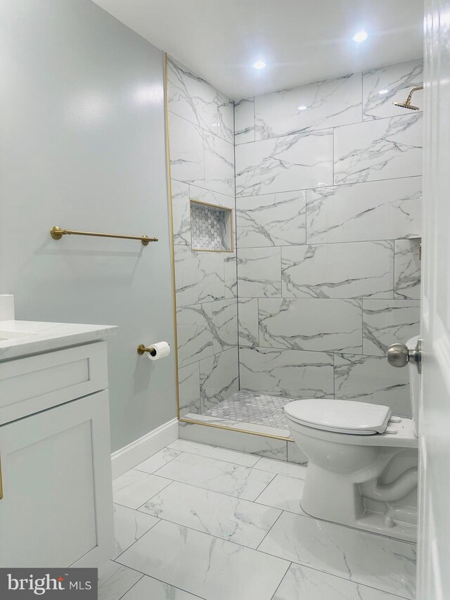 7002 Taylor Manor Ave, Temple Hills, MD 20748 - full bath with vanity, baseboards, a marble finish shower, toilet, and marble finish floors