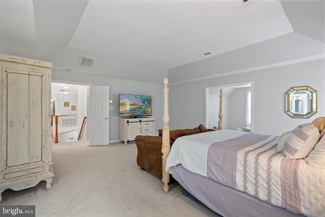 4209 Hardy Ridge Dr, Woodbridge, VA 22192 - bedroom featuring visible vents, light carpet, and a raised ceiling