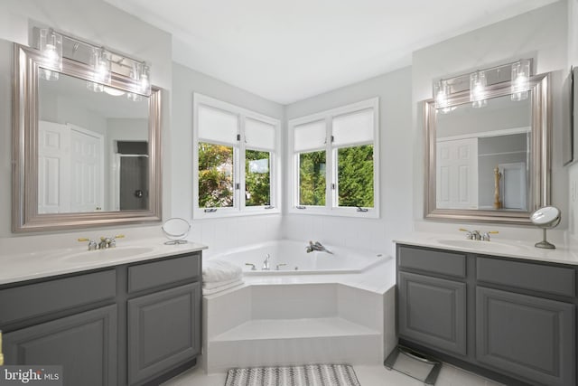 4209 Hardy Ridge Dr, Woodbridge, VA 22192 - full bath with a sink, a jetted tub, a shower with shower door, and two vanities