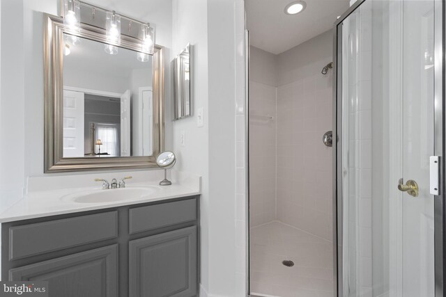 4209 Hardy Ridge Dr, Woodbridge, VA 22192 - bathroom featuring vanity, a stall shower, and recessed lighting