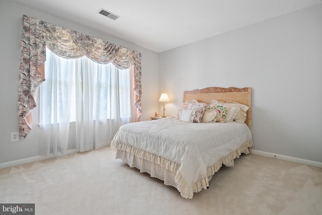 4209 Hardy Ridge Dr, Woodbridge, VA 22192 - bedroom with carpet flooring, baseboards, and visible vents