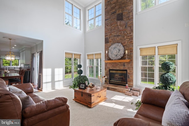 4209 Hardy Ridge Dr, Woodbridge, VA 22192 - living room with crown molding, plenty of natural light, a fireplace, and a towering ceiling