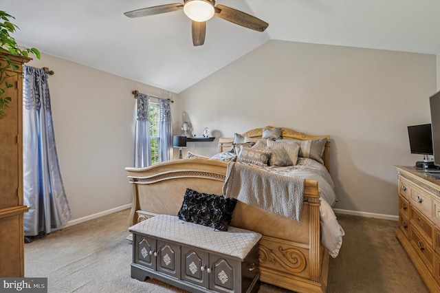 carpeted bedroom featuring baseboards, ceiling fan, and lofted ceiling