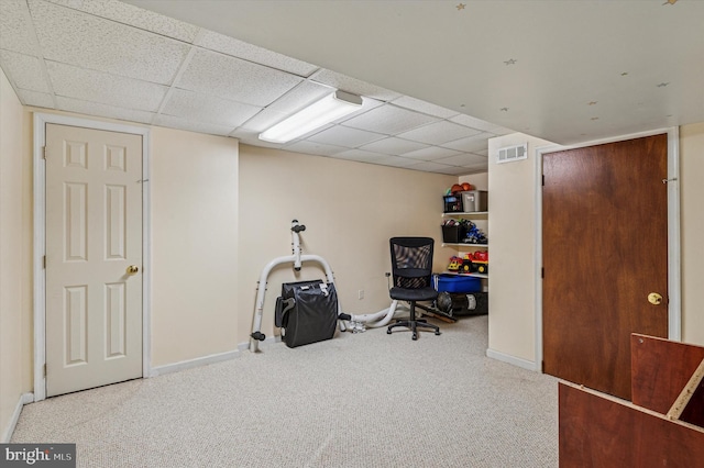 interior space with visible vents, carpet flooring, a paneled ceiling, and baseboards
