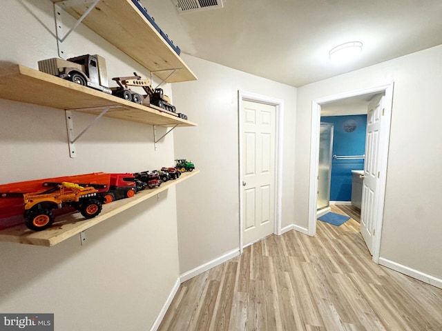 21 Holmes Dr, Charles Town, WV 25414 - interior space featuring baseboards, visible vents, and light wood-style floors