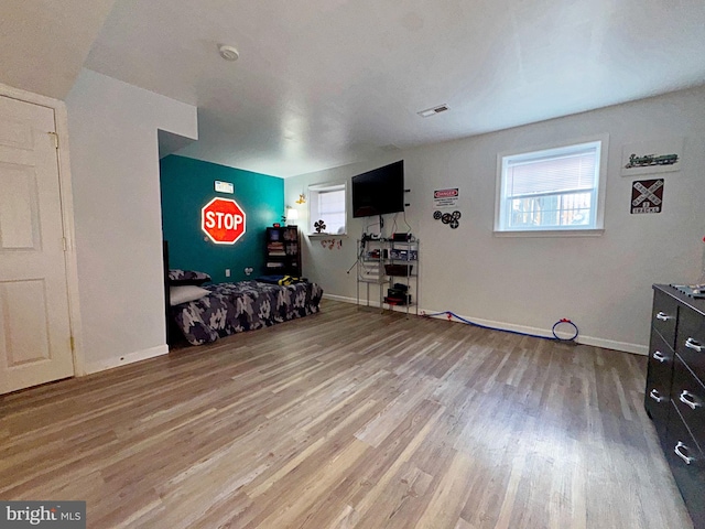 21 Holmes Dr, Charles Town, WV 25414 - recreation room featuring baseboards, light wood finished floors, a healthy amount of sunlight, and visible vents