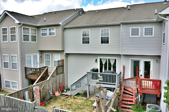 21 Holmes Dr, Charles Town, WV 25414 - rear view of property with a wooden deck, fence, stairs, and central AC unit