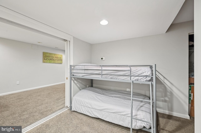 carpeted bedroom with baseboards and recessed lighting