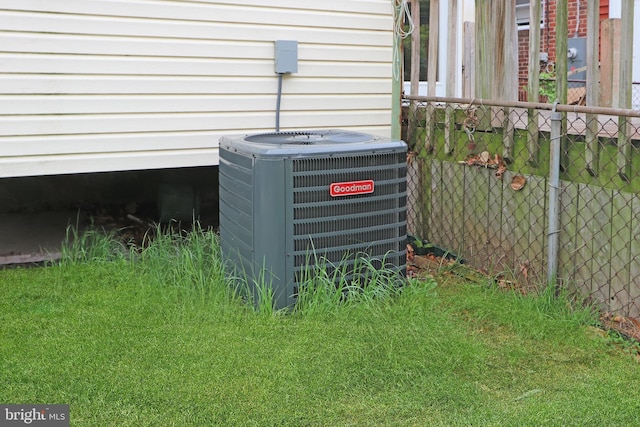 details featuring central AC and fence