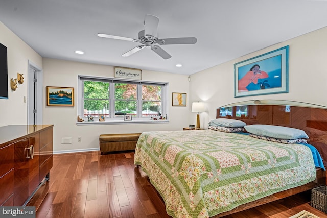 bedroom featuring baseboards, recessed lighting, a ceiling fan, and wood finished floors