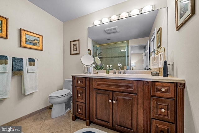 full bathroom featuring visible vents, a stall shower, vanity, baseboards, and toilet