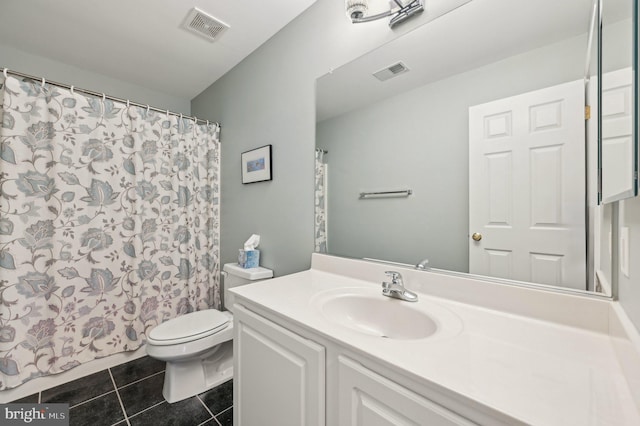 bathroom with toilet, tile patterned floors, visible vents, and vanity