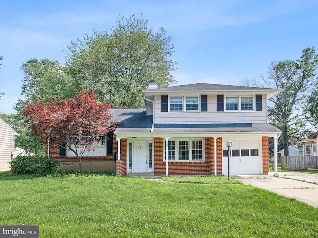508 Garrick Rd, Hockessin, DE 19707 - traditional-style house with a garage, driveway, a chimney, brick siding, and roof with shingles