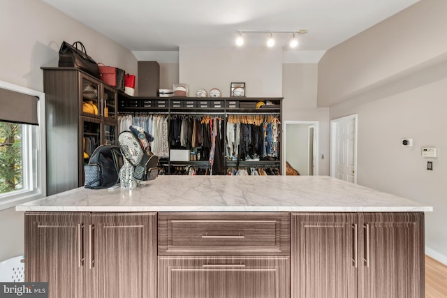 spacious closet with wood finished floors