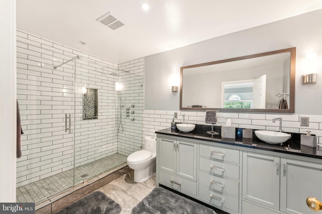 3015 Oregon Knolls Dr NW, Washington, DC 20015 - full bath with a shower stall, double vanity, tile walls, and toilet