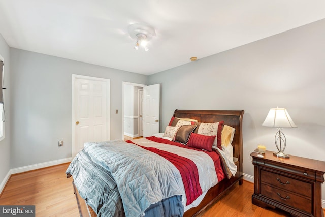 3015 Oregon Knolls Dr NW, Washington, DC 20015 - bedroom featuring baseboards and wood finished floors