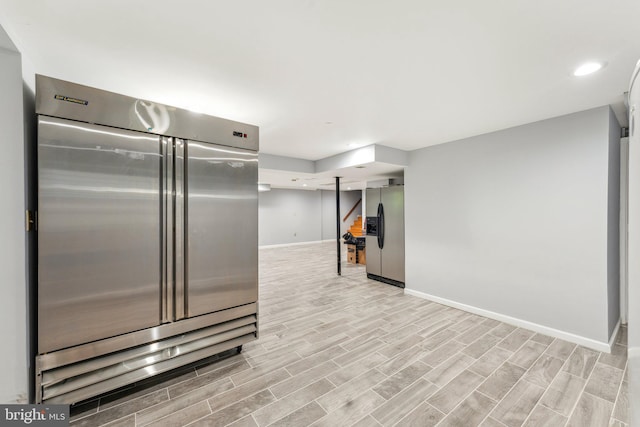 3015 Oregon Knolls Dr NW, Washington, DC 20015 - kitchen with stainless steel fridge with ice dispenser, stainless steel built in refrigerator, baseboards, light wood-type flooring, and recessed lighting