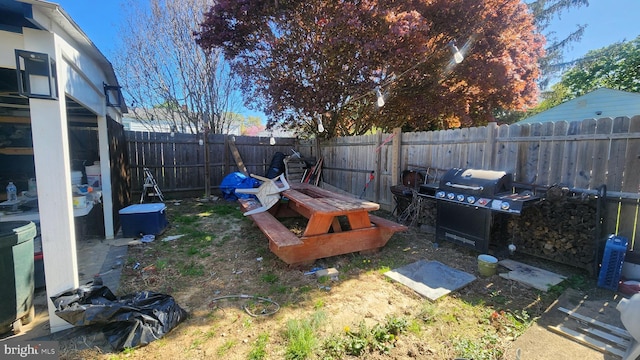 view of yard with a fenced backyard