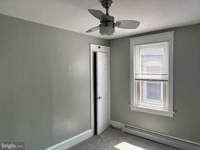 15 Kern St, Collingdale, PA 19023 - unfurnished bedroom featuring a baseboard radiator, light carpet, and a ceiling fan