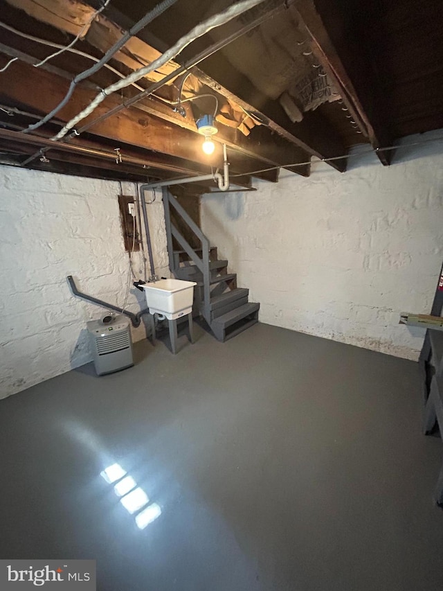 15 Kern St, Collingdale, PA 19023 - unfinished basement featuring a sink and stairway