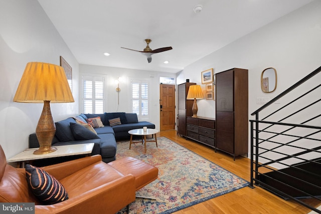 living area featuring recessed lighting, ceiling fan, and light wood-style flooring