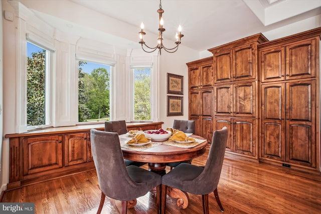 10601 Little Run Farm Ct, Vienna, VA 22182 - dining room with an inviting chandelier, plenty of natural light, wood finished floors, and lofted ceiling