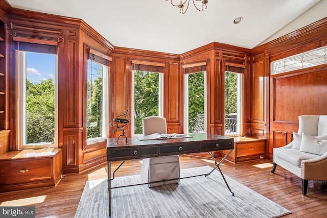 10601 Little Run Farm Ct, Vienna, VA 22182 - office area with wood walls, vaulted ceiling, light wood-style flooring, and a decorative wall