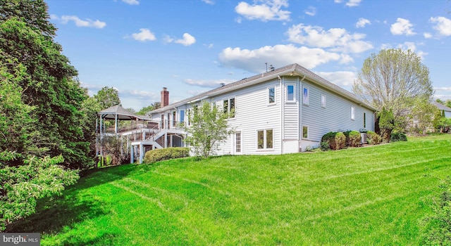 10601 Little Run Farm Ct, Vienna, VA 22182 - back of property with a lawn, a gazebo, and a chimney
