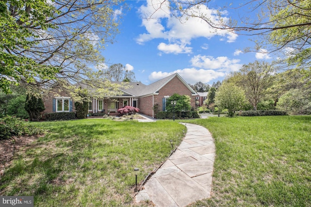 10601 Little Run Farm Ct, Vienna, VA 22182 - view of front facade with a front lawn and brick siding