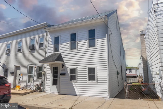 1605 Center St, Lebanon, PA 17042 - multi unit property featuring fence, cooling unit, a patio area, and metal roof