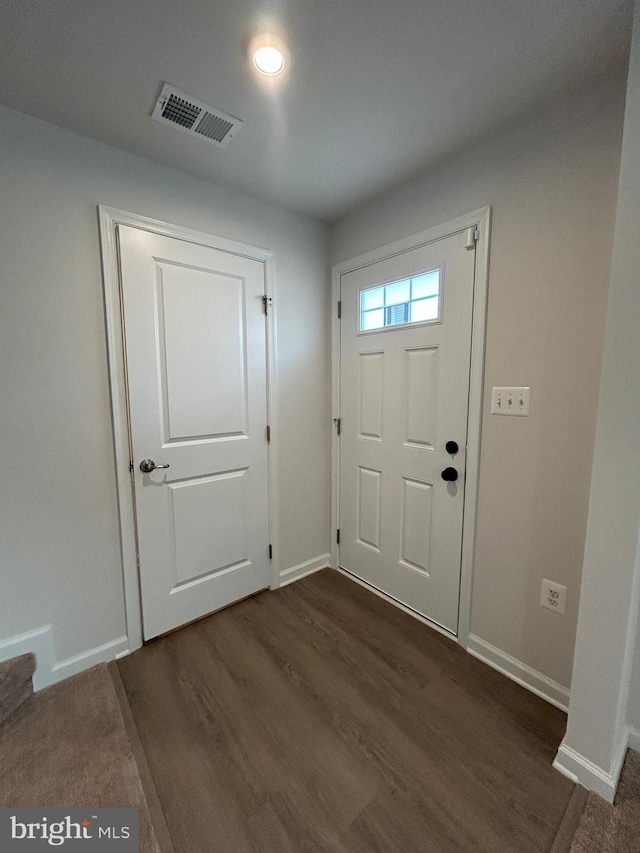 1108 Dovetail Cir, Fredericksburg, VA 22401 - foyer entrance with baseboards and dark wood-type flooring