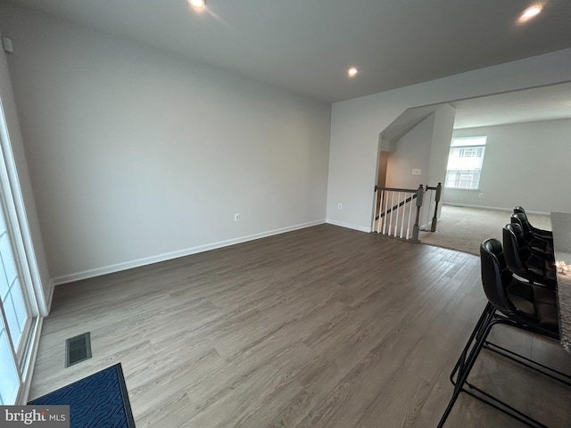 1108 Dovetail Cir, Fredericksburg, VA 22401 - empty room featuring dark wood-style floors, baseboards, and recessed lighting
