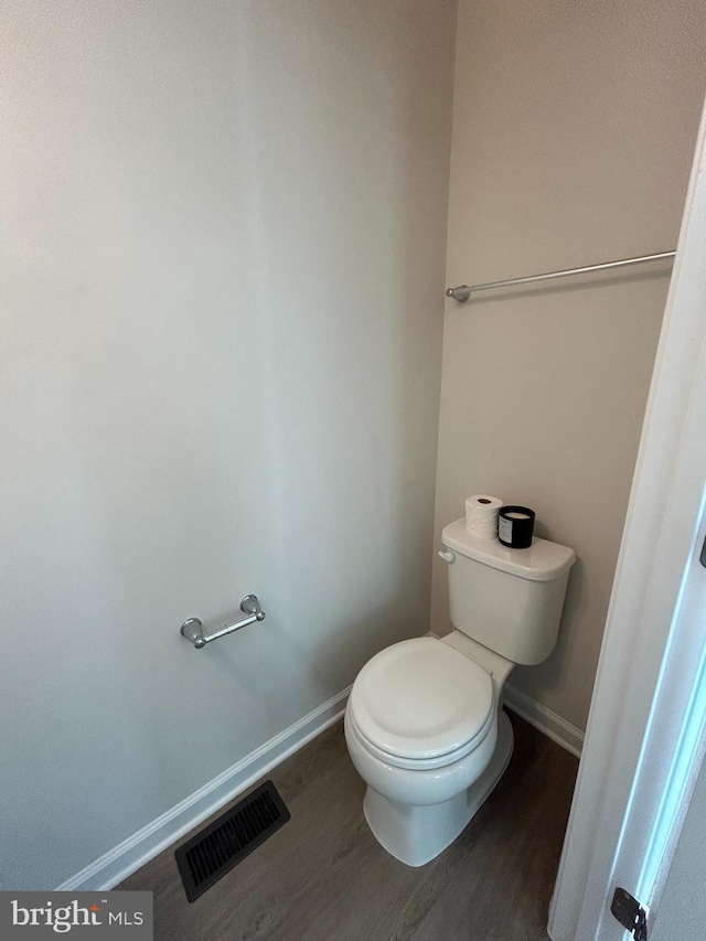 1108 Dovetail Cir, Fredericksburg, VA 22401 - bathroom featuring wood finished floors, baseboards, and toilet