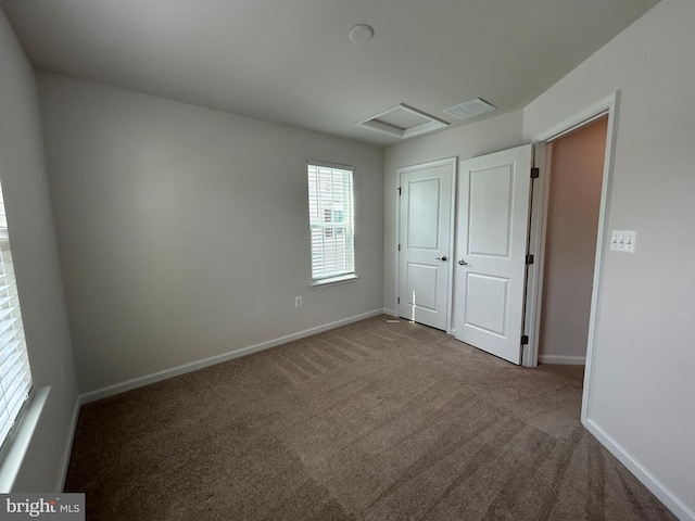 1108 Dovetail Cir, Fredericksburg, VA 22401 - unfurnished bedroom featuring attic access, carpet flooring, and baseboards