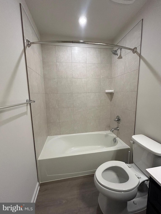 1108 Dovetail Cir, Fredericksburg, VA 22401 - bathroom featuring wood finished floors, toilet, washtub / shower combination, vanity, and recessed lighting
