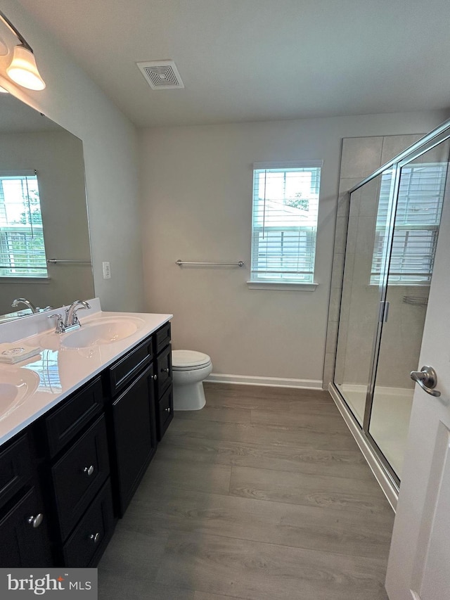 1108 Dovetail Cir, Fredericksburg, VA 22401 - full bathroom with plenty of natural light, a shower stall, and double vanity