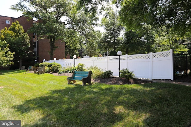 view of yard featuring fence
